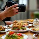 Food blogger photographing dishes